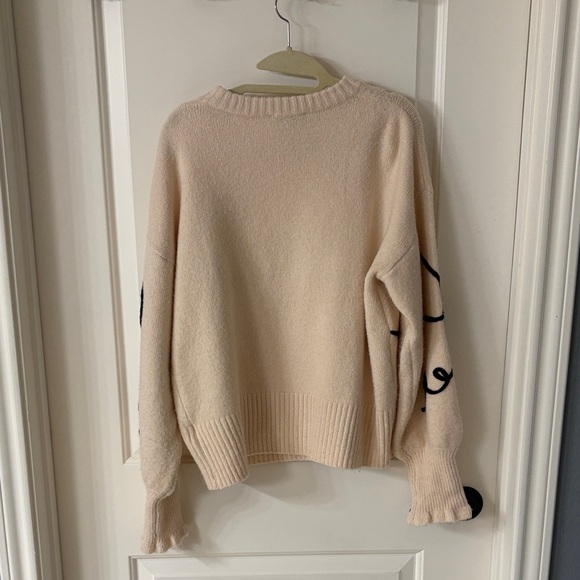 Gilli Cream Sweater with Black Bow Design - Picture 2 of 2